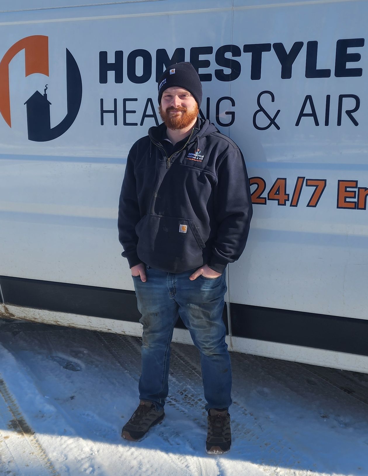 HomeStyle Heating and Air HVAC technician servicing a home heating system